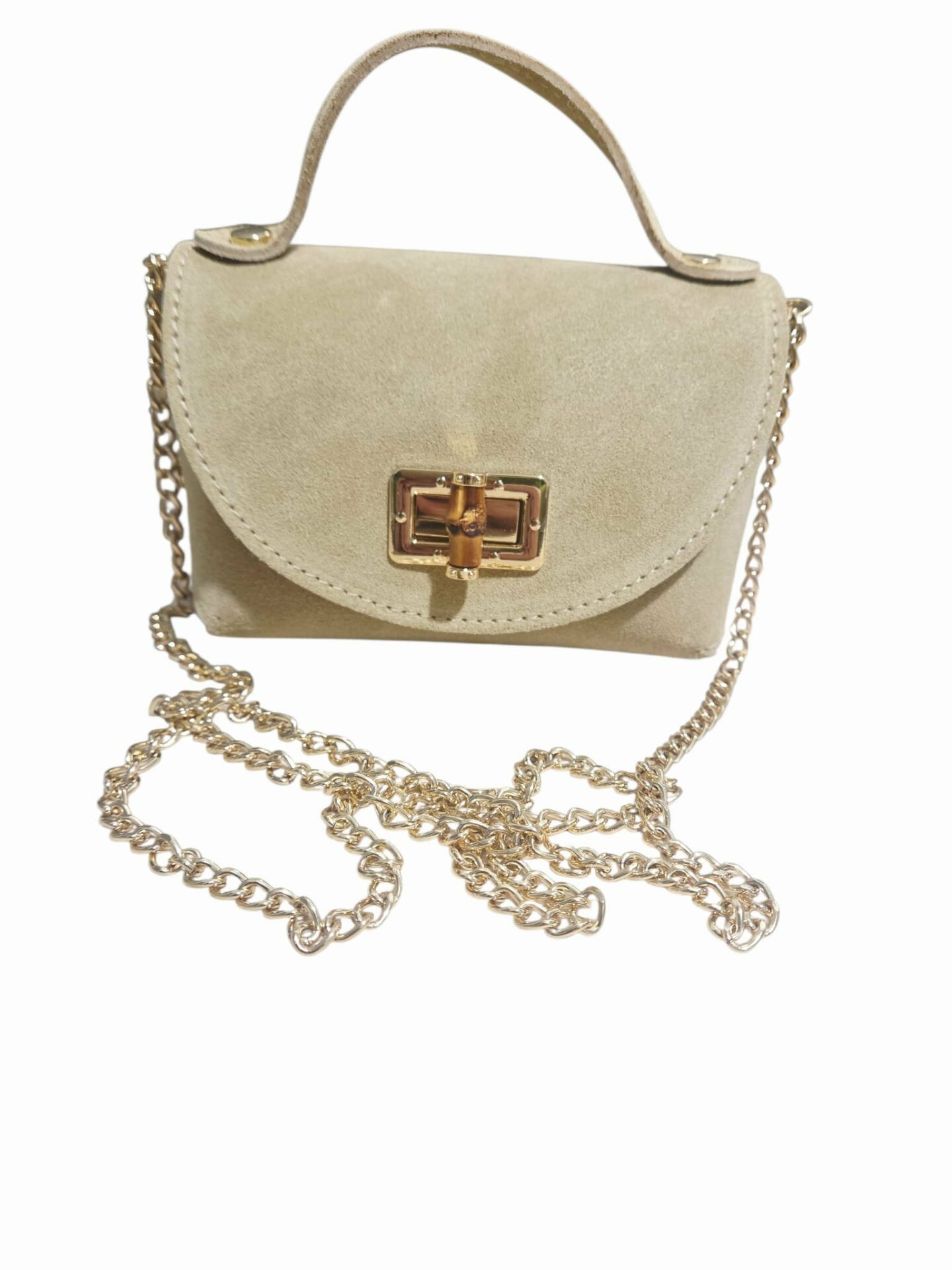 Suede shoulder bag with gold chain and bone closure. Size L16 W8 H10. Suede, genuine leather, made in Italy. Free shipping Tracollina in suede con catenella dorata,chiusura in osso. Misura L16 B8 H10. Camoscio,vera pelle,made Italy. Spedizione Gratuita