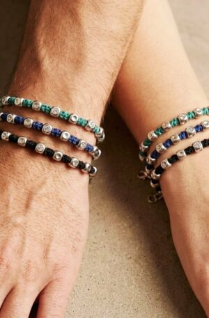 Bracciale unisex realizzato con tessuto e pepite in argento925 . Lunghezza regolabile Spedizione Gratuita