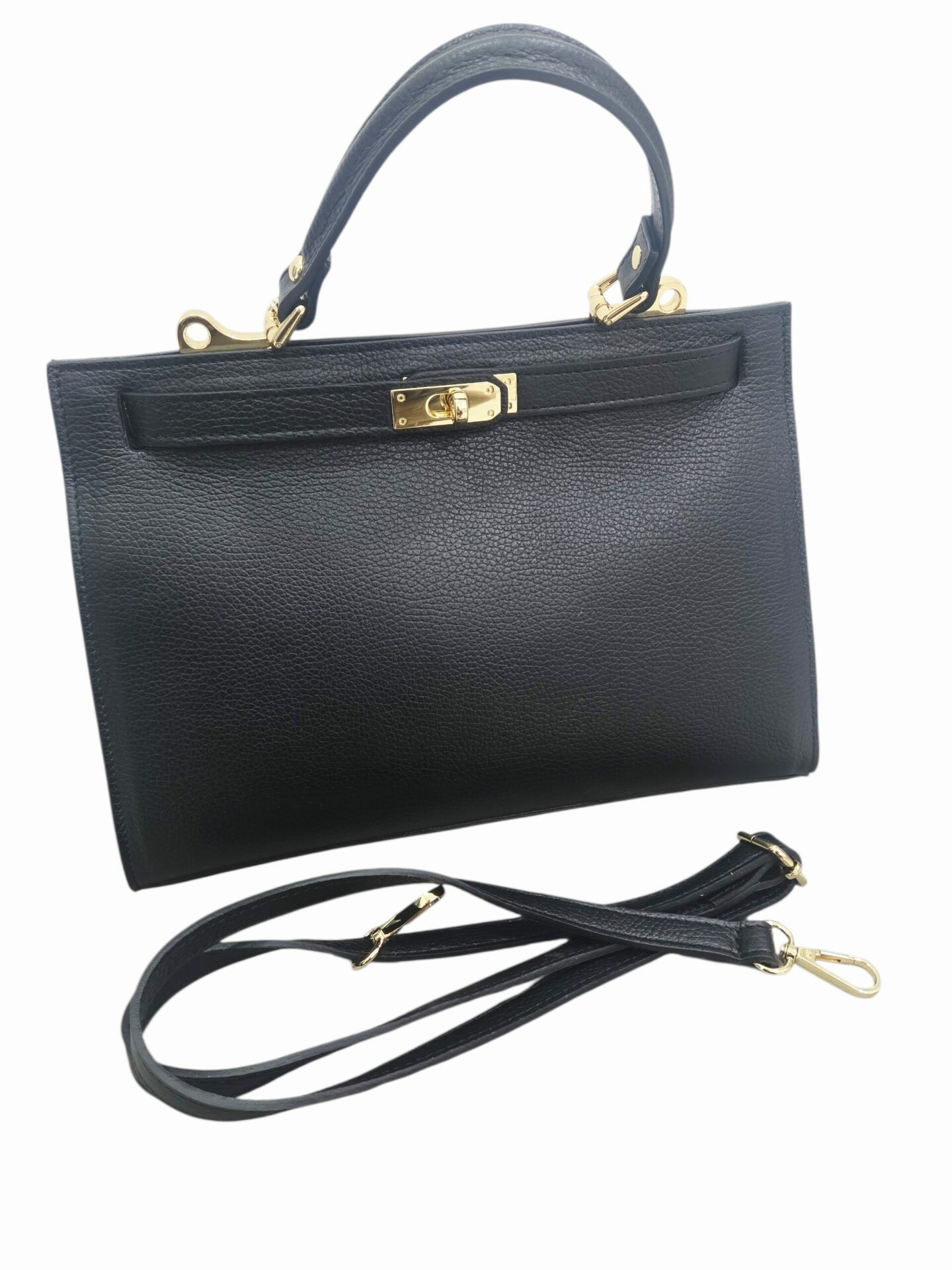 Genuine leather bag, made in Italy, with shoulder strap, single internal compartment with side zip pocket. Gold Hermes style closure. Color: Black. Dimensions: L 33 W 13 H 23 Free shipping Borsa in vera pelle,made Italy, dotata di tracolla,interno scomparto unico con tasca con zip laterale. chiusura dorata modello hermes. colore neromisure L33 B13 H23 Spedizione Gratuita