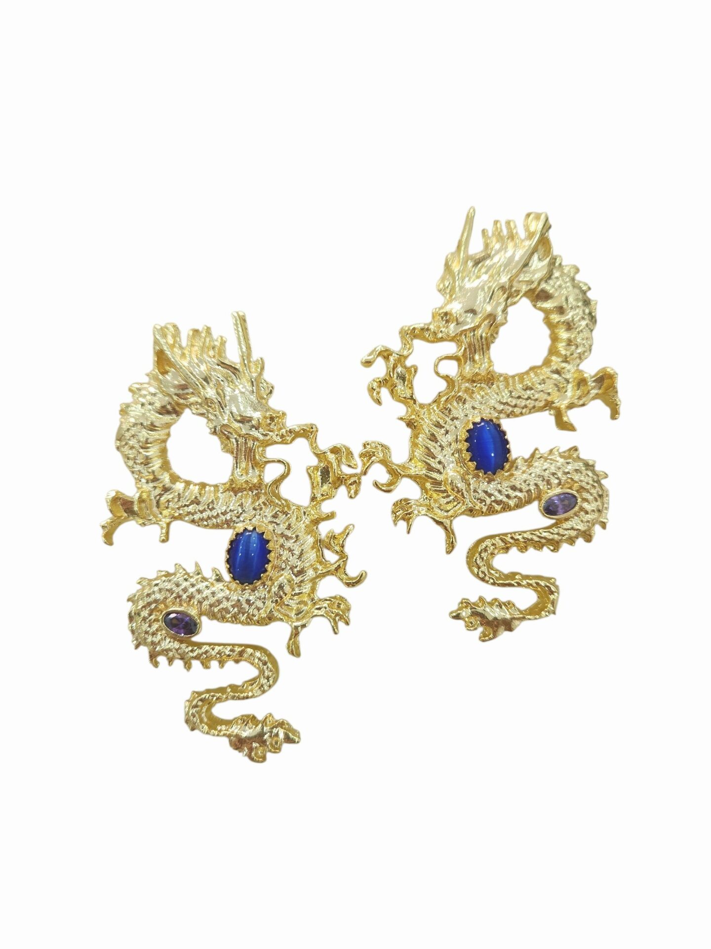 Orecchini Drago realizzati in ottone con quarzo ed occhio di gatto incastonati
lunghezza 5cm
peso 17gr Spedizione Gratuita