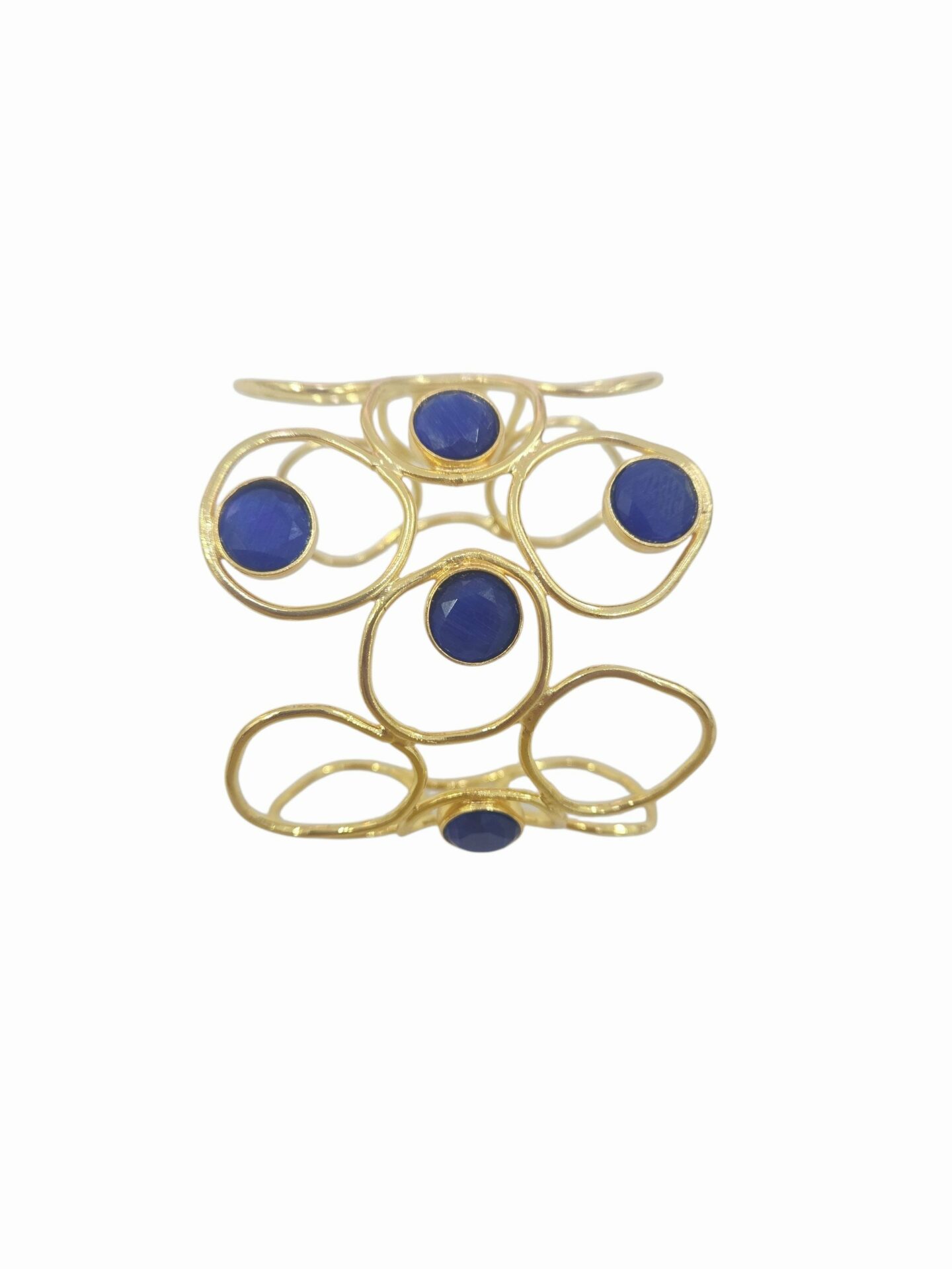 Bracciale ad incastro realizzato su base in ottone con pietre blu occhio di gatto incastonate. Spedizione Gratuita Bracciale ad incastro realizzato su base in ottone con pietre blu occhio di gatto incastonate. Spedizione Gratuita