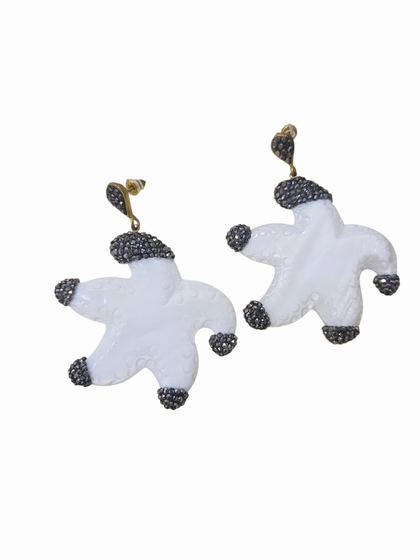 Orecchini realizzati con stella marina in madreperla e marcasite 
peso 12.2gr
lunghezza 6cm Spedizione Gratuita