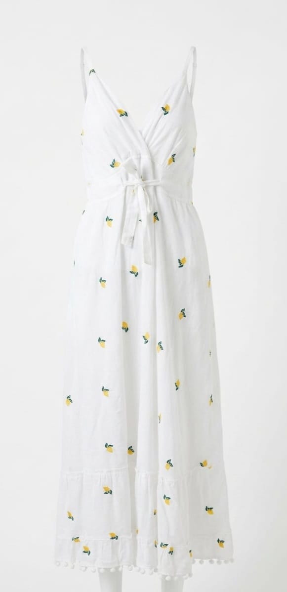 Abito lungo 100% cotone bianco con limoni ricamati  con bratelline regolabili, retro elasticizzato e pom pom finali.  Taglia unica Spedizione Gratuita