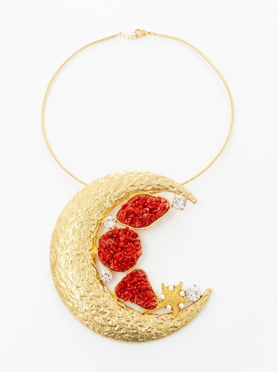 Collana girocollo regolabile con ciondolo luna in ottone con corallo e zirconi
grandezza ciondolo 10cm Spedizione Gratuita
